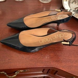 Gorgeous navy patent low heeled sling backs